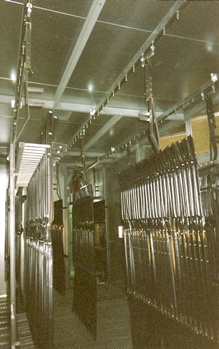 Convoynort - Overhead monorail chain conveyor - 1000 series - Conveyor in a high temperature cooking stove